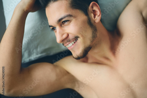 Male waking up in bad