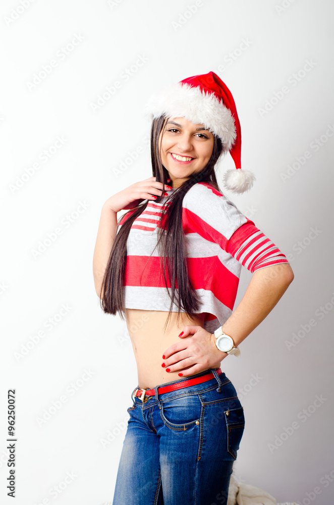  woman wearing a santa hat 