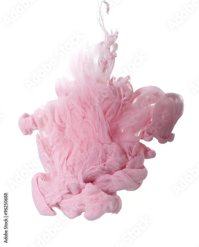 Abstraction of pink acrylic paint in water..