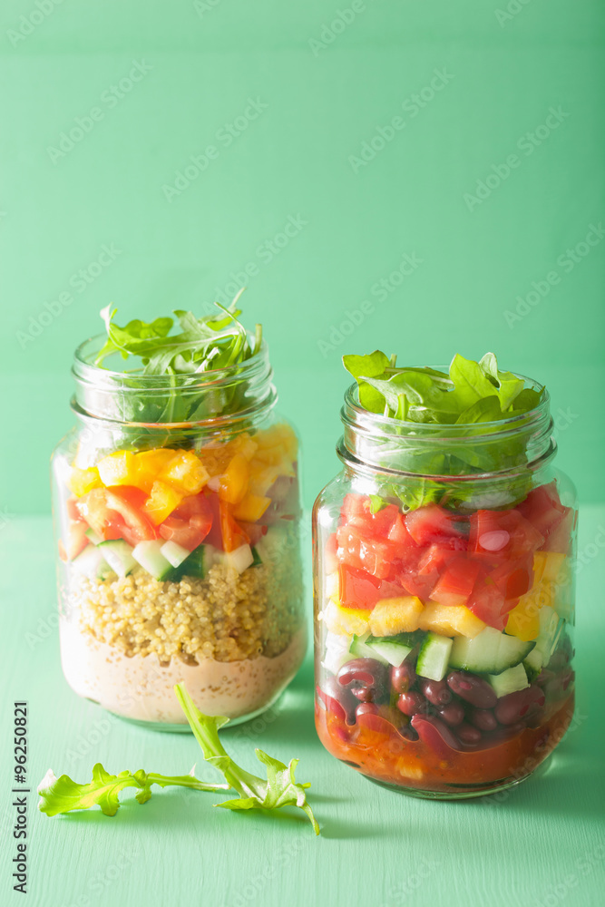 vegan quinoa bean vegetable salad in mason jars vegan quinoa bean vegetable salad in mason jars