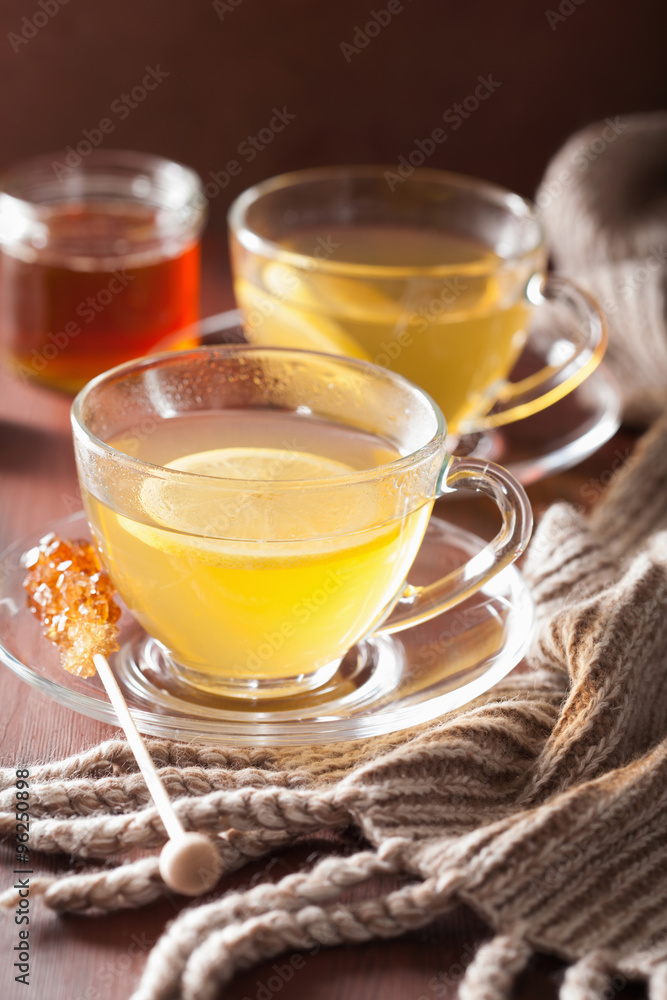 hot lemon ginger honey tea in glass cup hot lemon ginger honey tea in glass cup