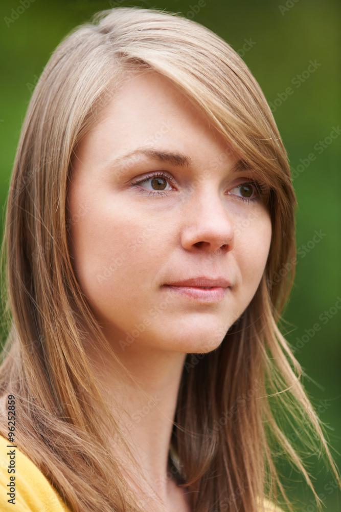 Portrait Of Thoughtful Young Woman Outdoors Portrait Of Thoughtful Young Woman Outdoors
