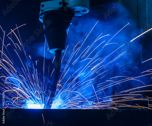 Welding robots movement in a car factory