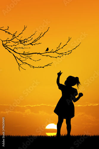 girl and bird on braches