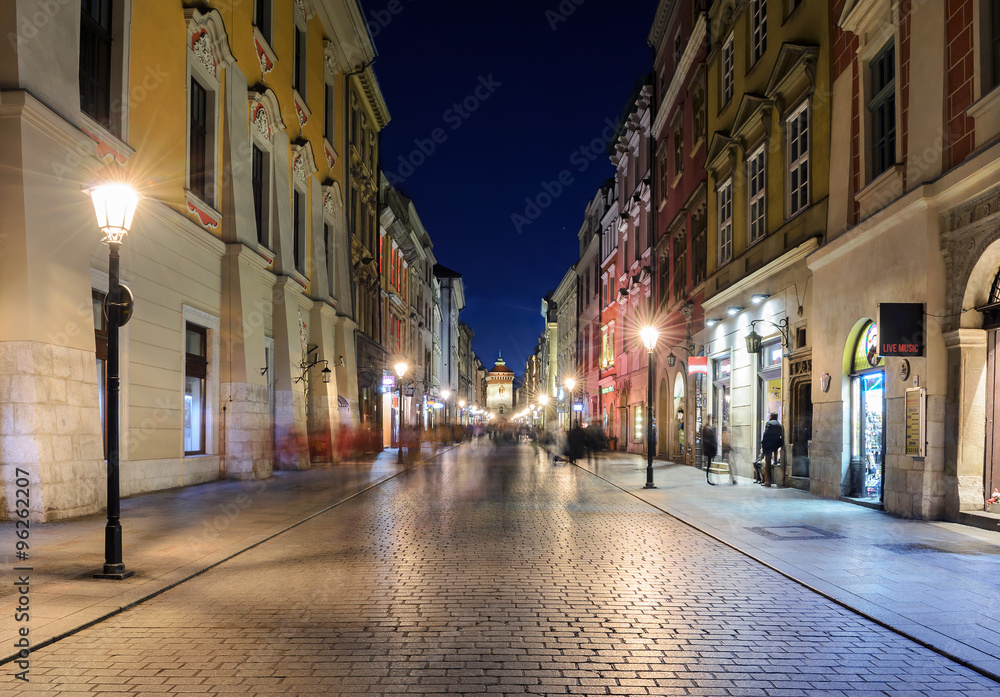 Colorful street in Krakow in the evening.
