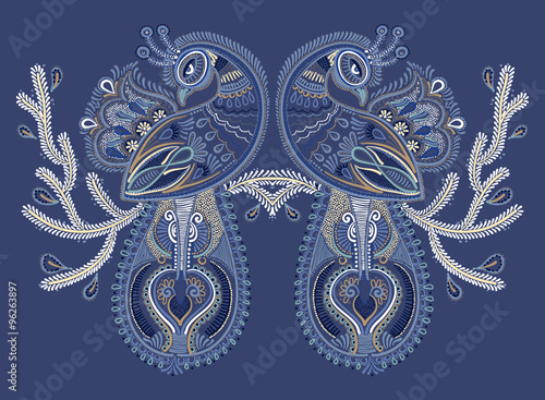 ethnic folk art of two peacock bird with flowering branch design