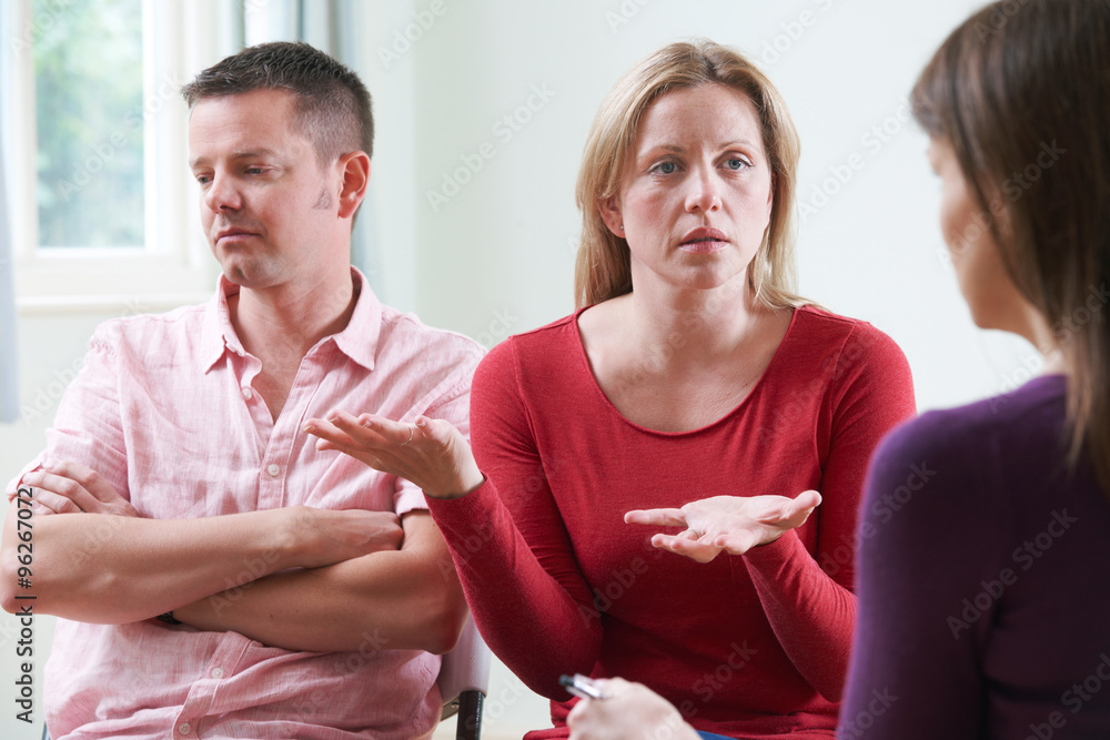 Couple Discussing Problems With Relationship Counsellor Couple Discussing Problems With Relationship Counsellor
