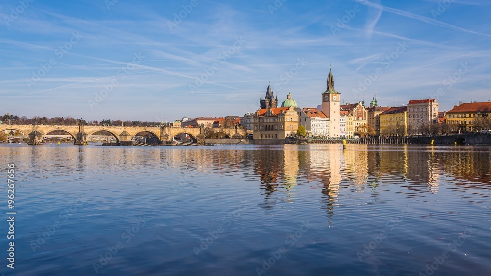 View of the Vltava River and the houses of prague in sunshine