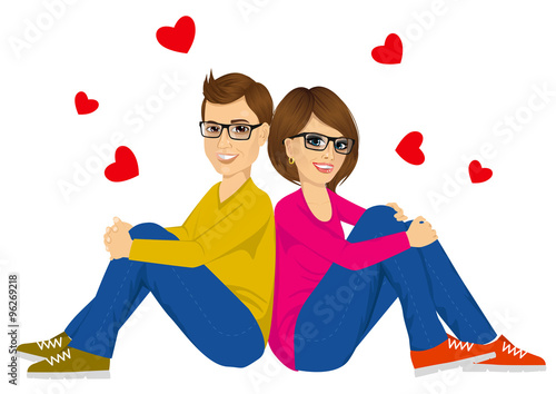 young couple sitting with back to each other