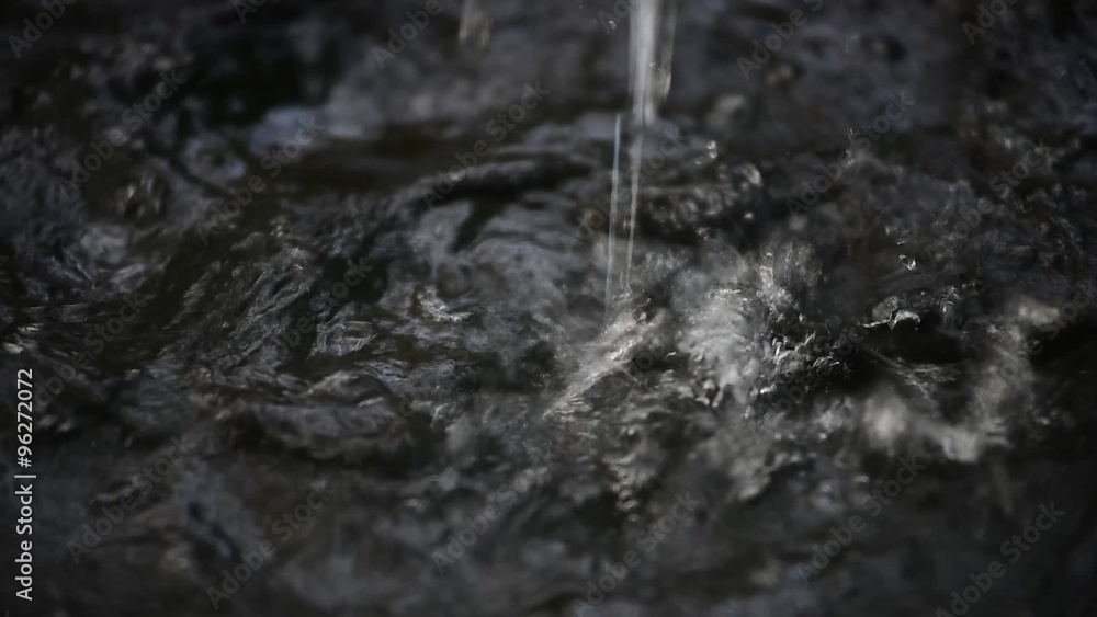 Rain water pouring in black basin Rain water pouring in black basin