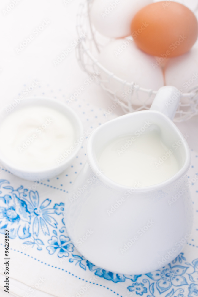 Composition with milk, yoghurt and eggs. Soft focus Composition with milk, yoghurt and eggs. Soft focus