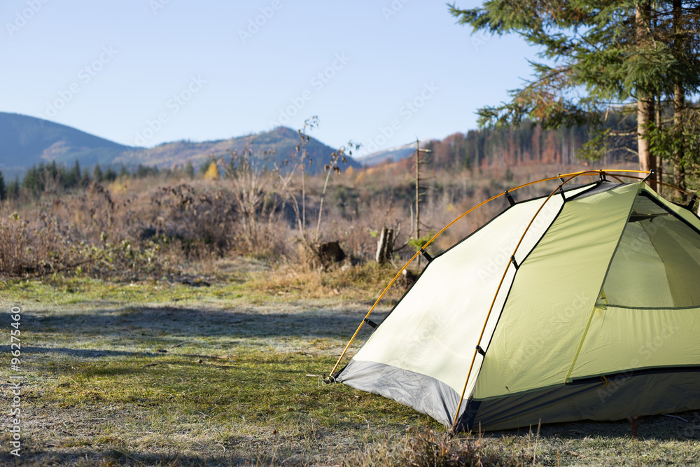 Green tent on mountain top, Retezat mountains, Romania