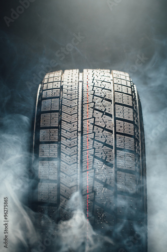 winter tire in smoke photo