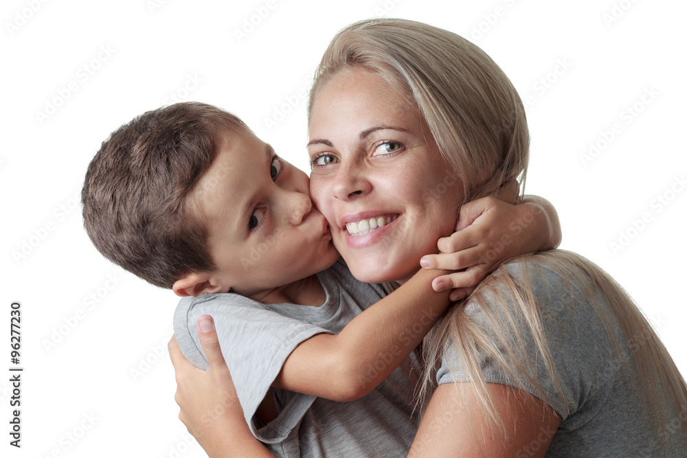 Son kissing his mother cheek and she smiling isolated on white b Son kissing his mother cheek and she smiling isolated on white b