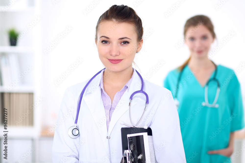 Portrait of young female doctor in a hospital Portrait of young female doctor in a hospital