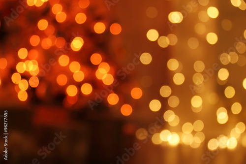 Celebratory background. Beautiful Rasfokus lights of Christmas garlands.
