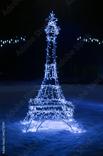 copy of the Eiffel Tower decorated with garland