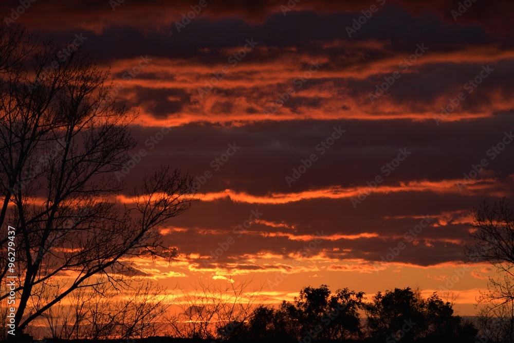 Orange and red sunset from a hilltop Orange and red sunset from a hilltop