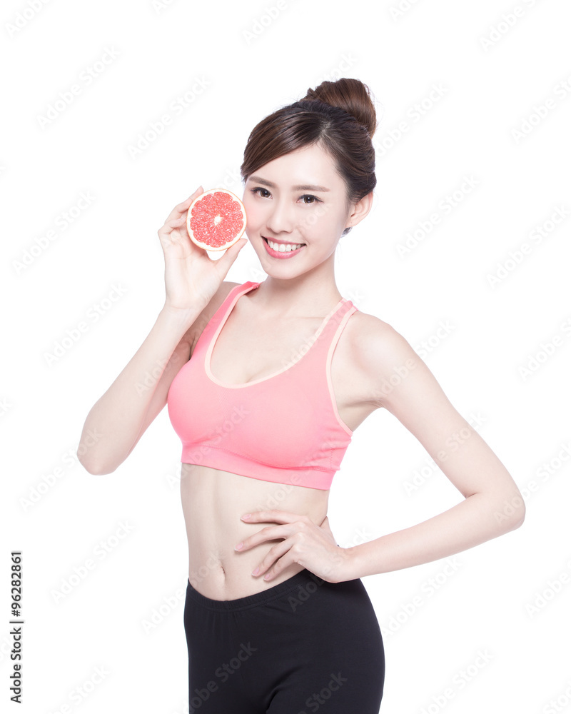 The healthy woman with grapefruit The healthy woman with grapefruit