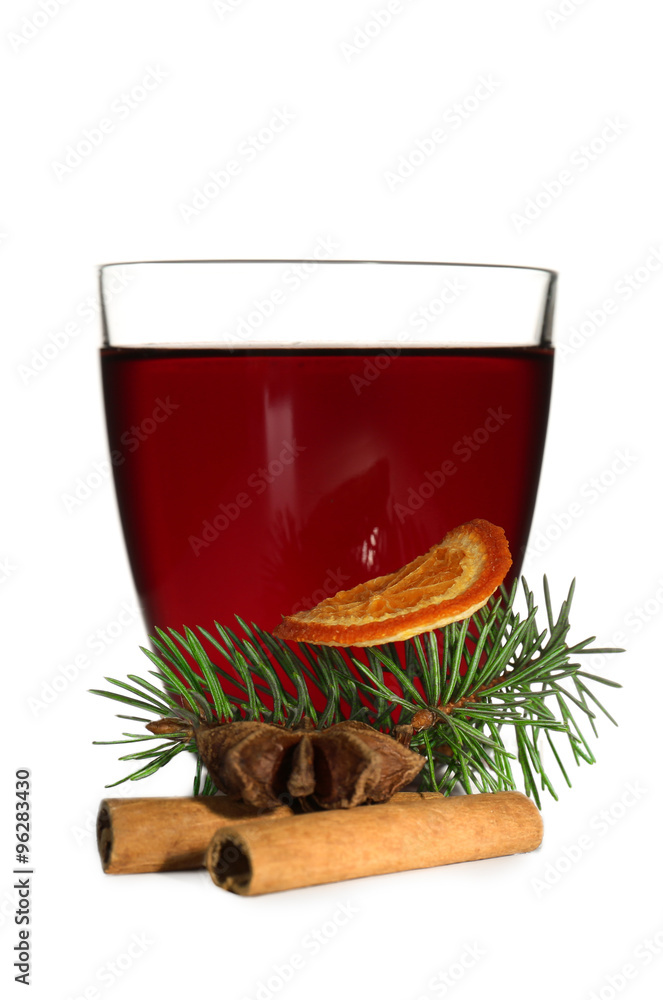 Mulled wine with spices on a table isolated on white Mulled wine with spices on a table isolated on white
