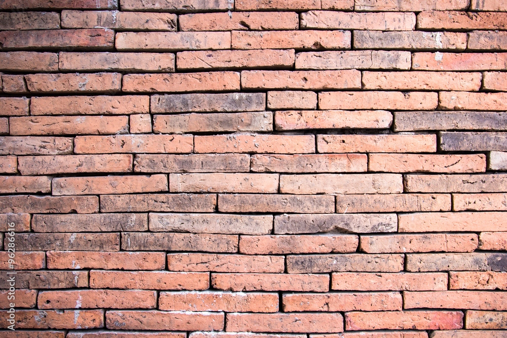 Fototapeta premium Ancient red brick wall background and texture