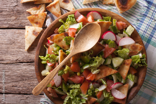 Konstfotografi Traditional Arabic fattoush salad closeup. Horizontal top view