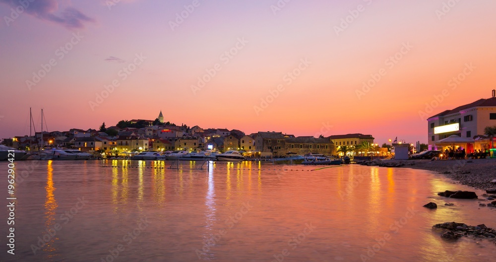 Beautiful purple sunset over the Adriatic sea in Primosten