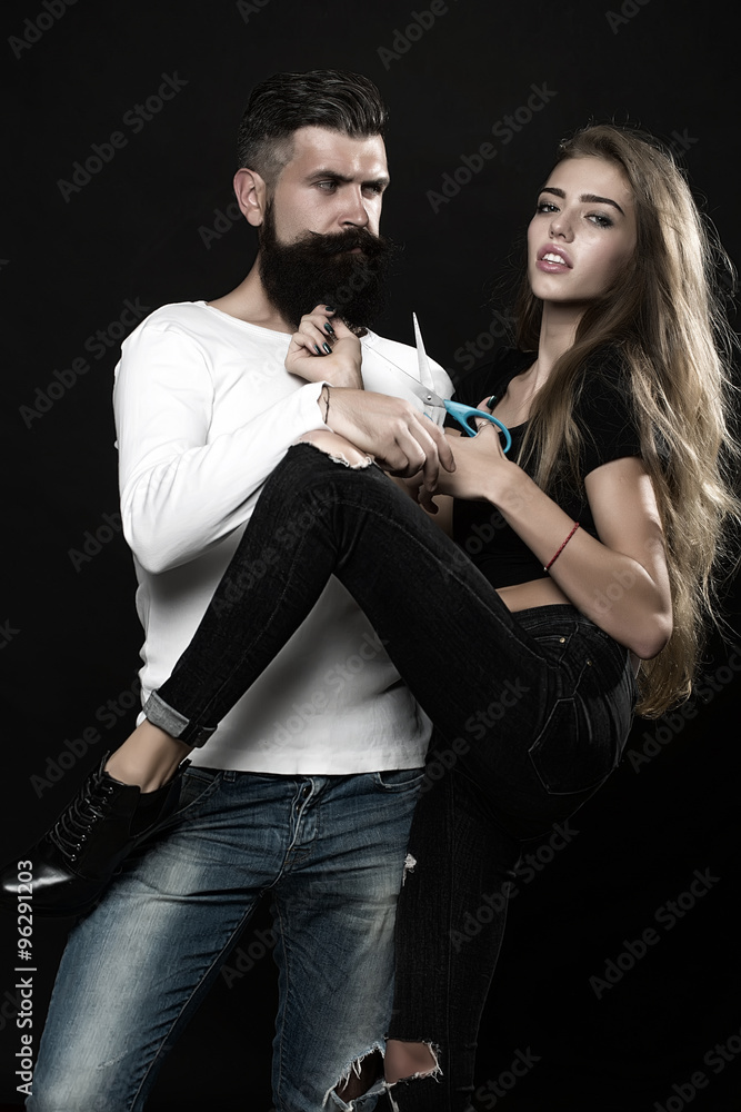 Man and woman with scissors Man and woman with scissors