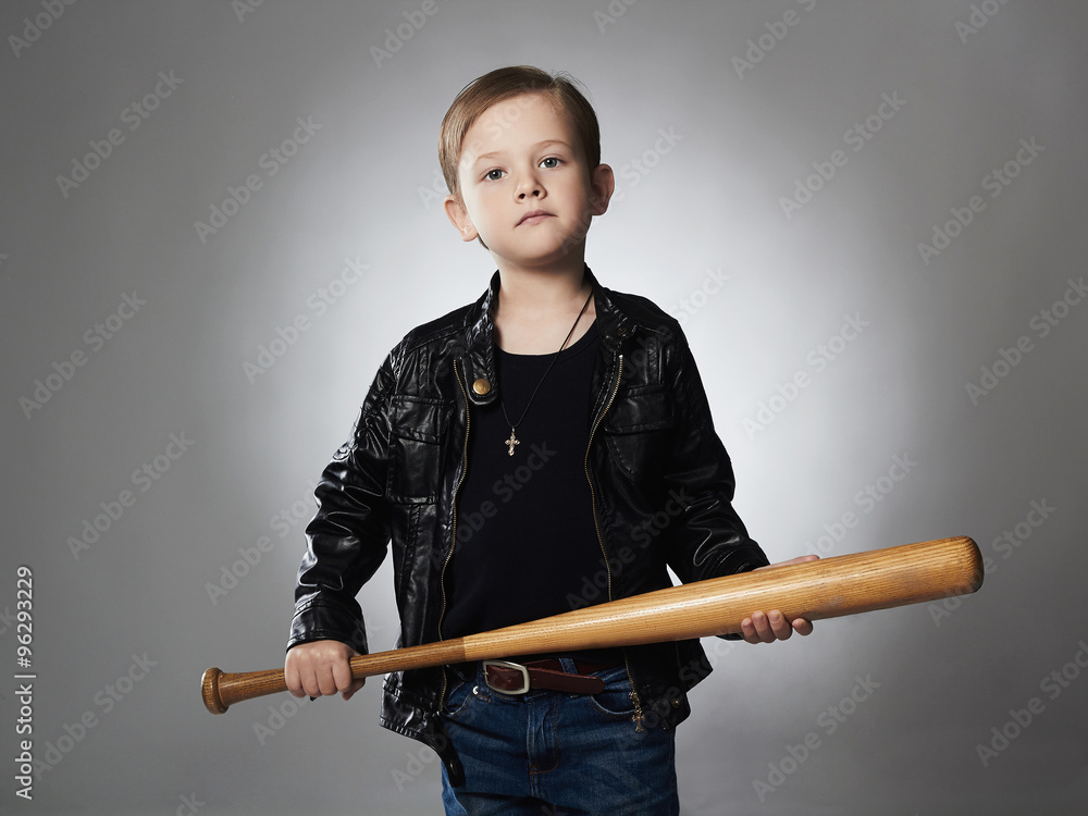 little criminal boy with baseball bat.Funny child in leather.thug little criminal boy with baseball bat.Funny child in leather.thug