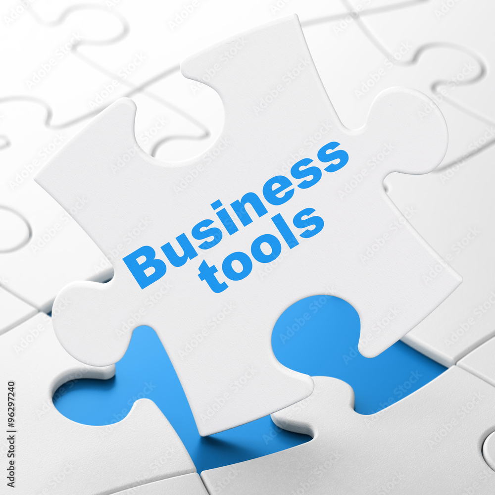 Finance concept: Business Tools on puzzle background Finance concept: Business Tools on puzzle background