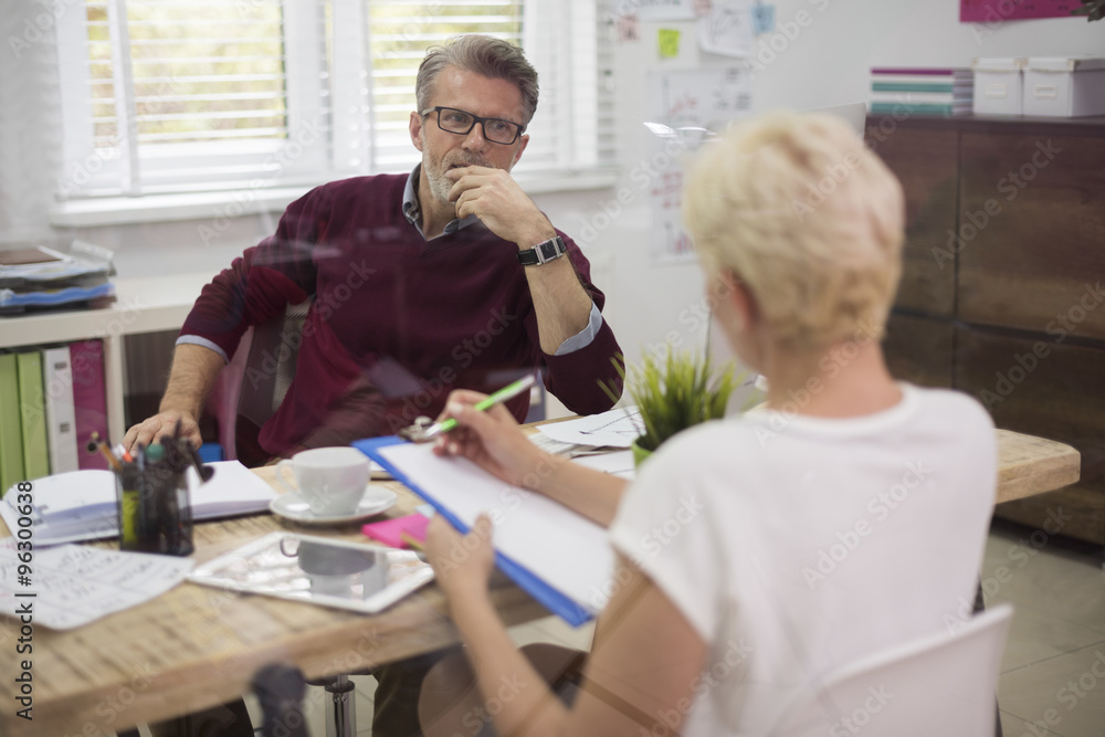 Fototapeta premium Cooperation between the executive and the secretary.