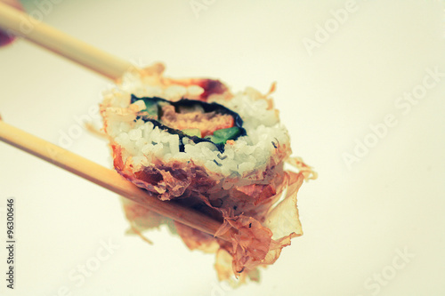 Sushi covered with dryed tuna with copy space