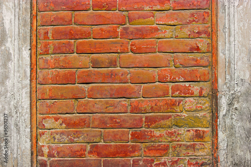 Weathered red brick feame for inscriptions photo