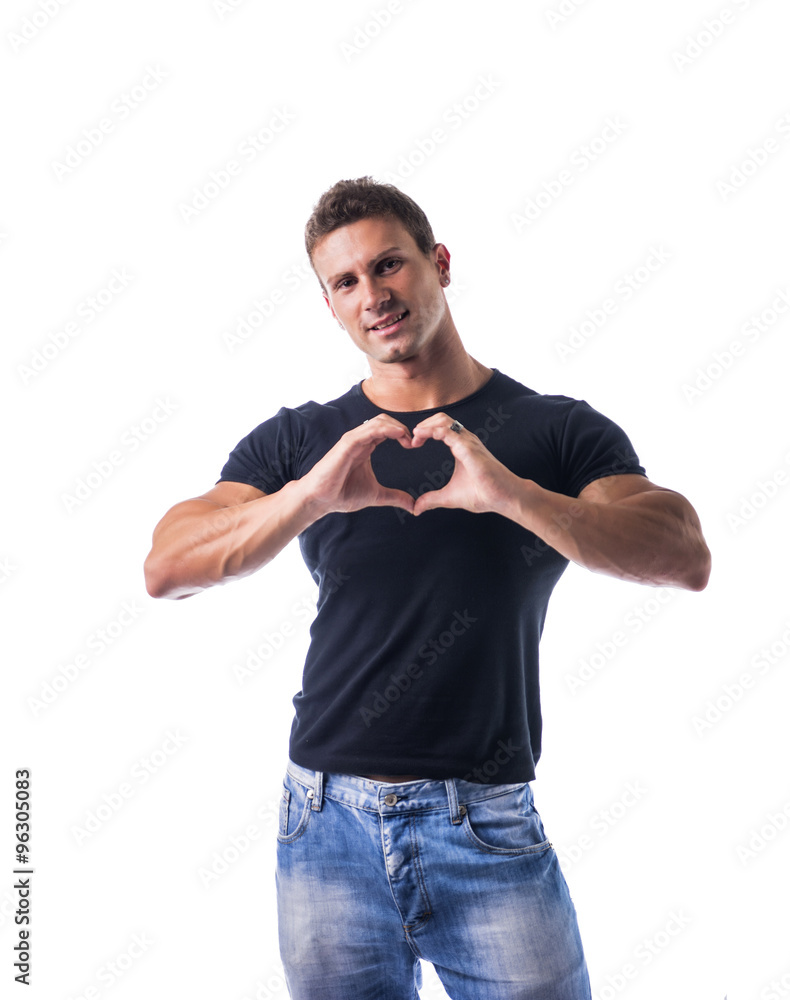 Handsome young man making heart sign with his hands and fingers Handsome young man making heart sign with his hands and fingers