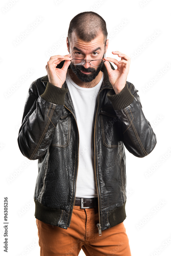 Man with leather jacket showing something Man with leather jacket showing something