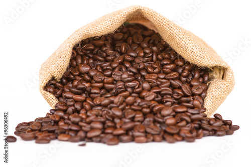 Coffee bag - coffee beans in canvas coffee sack isolated on white background © Wead