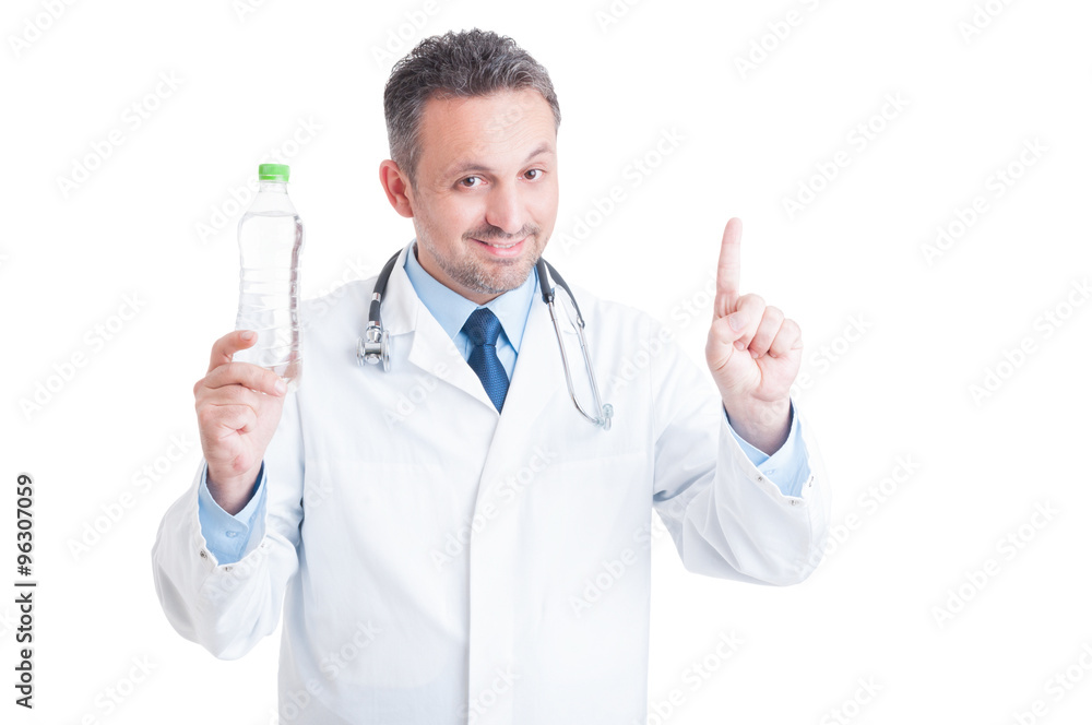 Handsome nutritionist holding a bottle of water as hydration imp Handsome nutritionist holding a bottle of water as hydration imp