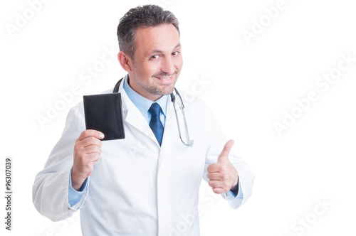 Smiling doctor or medic holding wallet and showing like