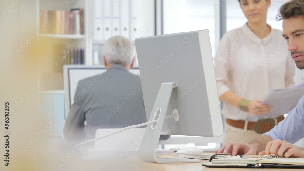 Business people working together on desktop Business people working together on desktop