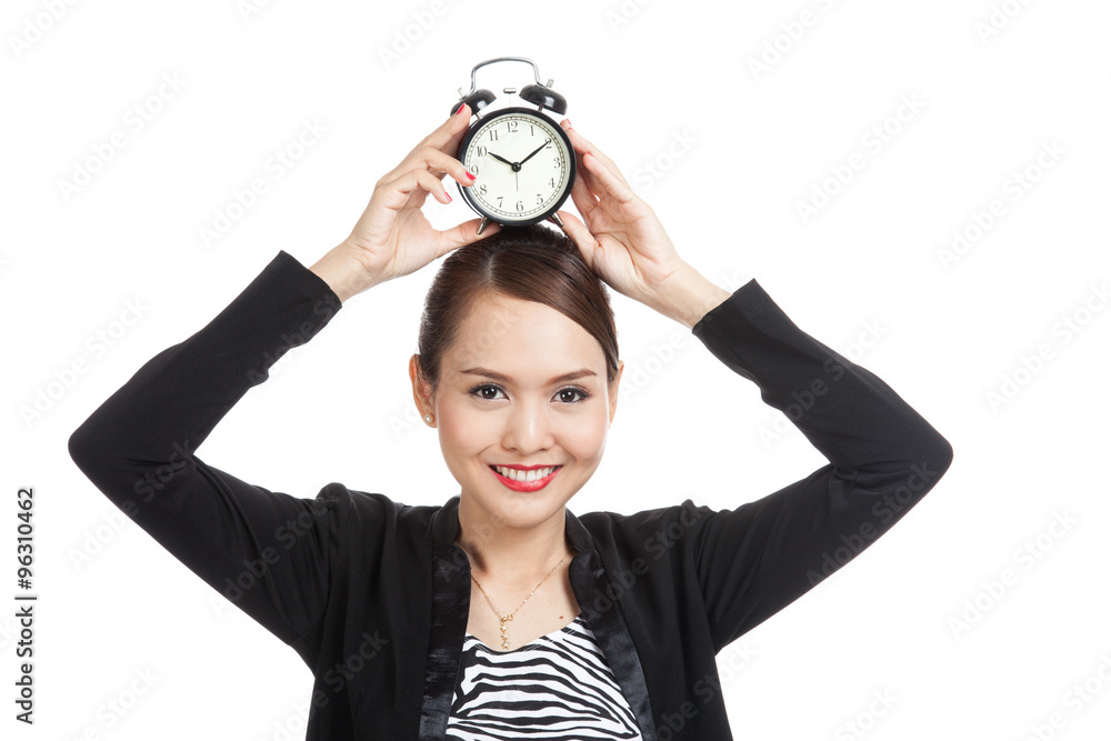 Young Asian business woman smile with a clock Young Asian business woman smile with a clock