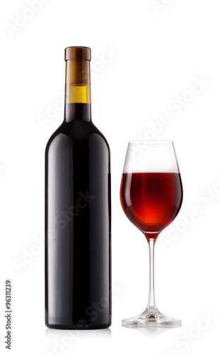 Dark bottle and glass with wine