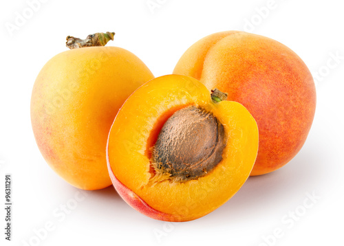 Whole and cut apricots with stones