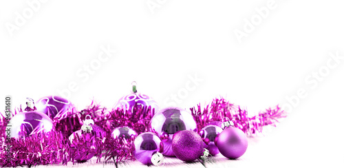 Pink Christmas tree balls and decorations isolated on white background © boxerx