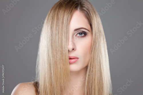 Young blonde beauty with straight hair