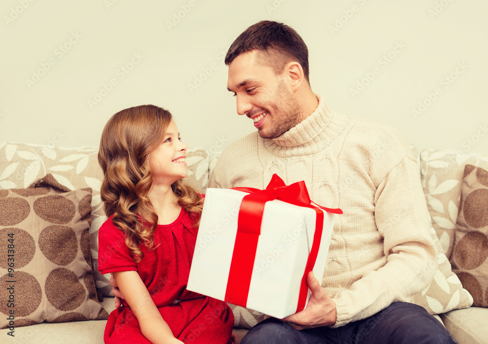 smiling father and daughter looking at each other smiling father and daughter looking at each other
