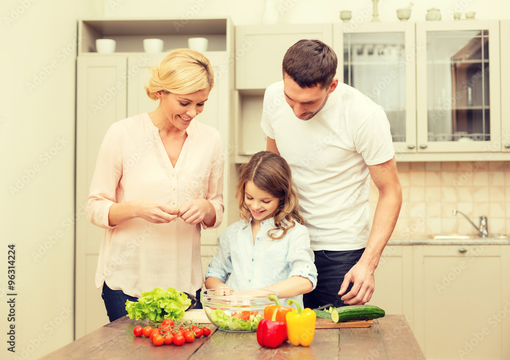 happy family making dinner in kitchen happy family making dinner in kitchen