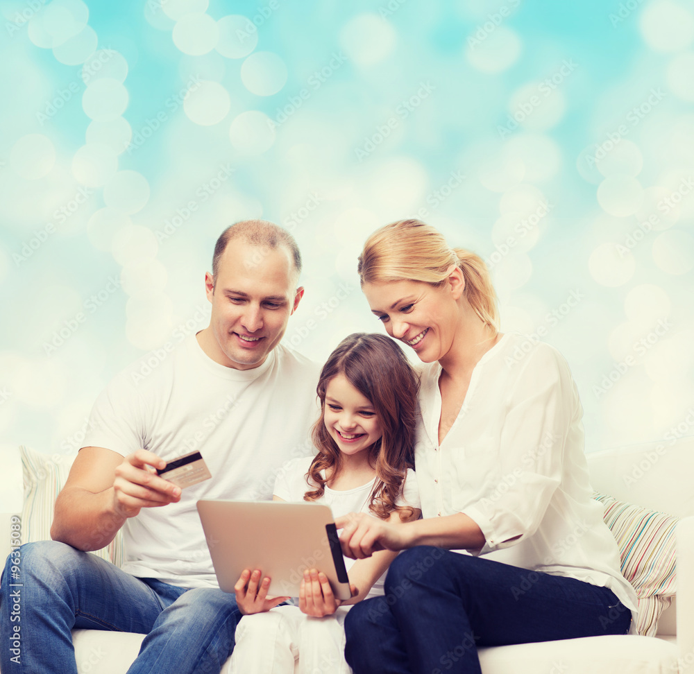 happy family with tablet pc and credit card happy family with tablet pc and credit card