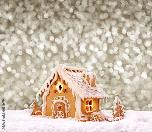 Gingerbread house isolated on grey background.