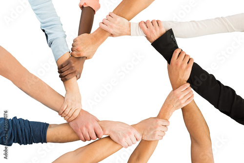 Creative Business People Holding Each Other's Hand Showing Unity © Andrey Popov