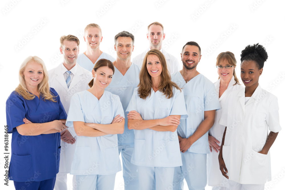 Happy Medical Team Standing Against White Background Happy Medical Team Standing Against White Background